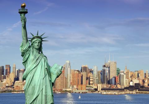 The Statue of Liberty with New York buildings in the background