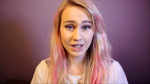 A young woman talking to the camera