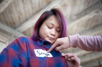 A woman with a name badge